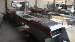 Vacuum thermoformer